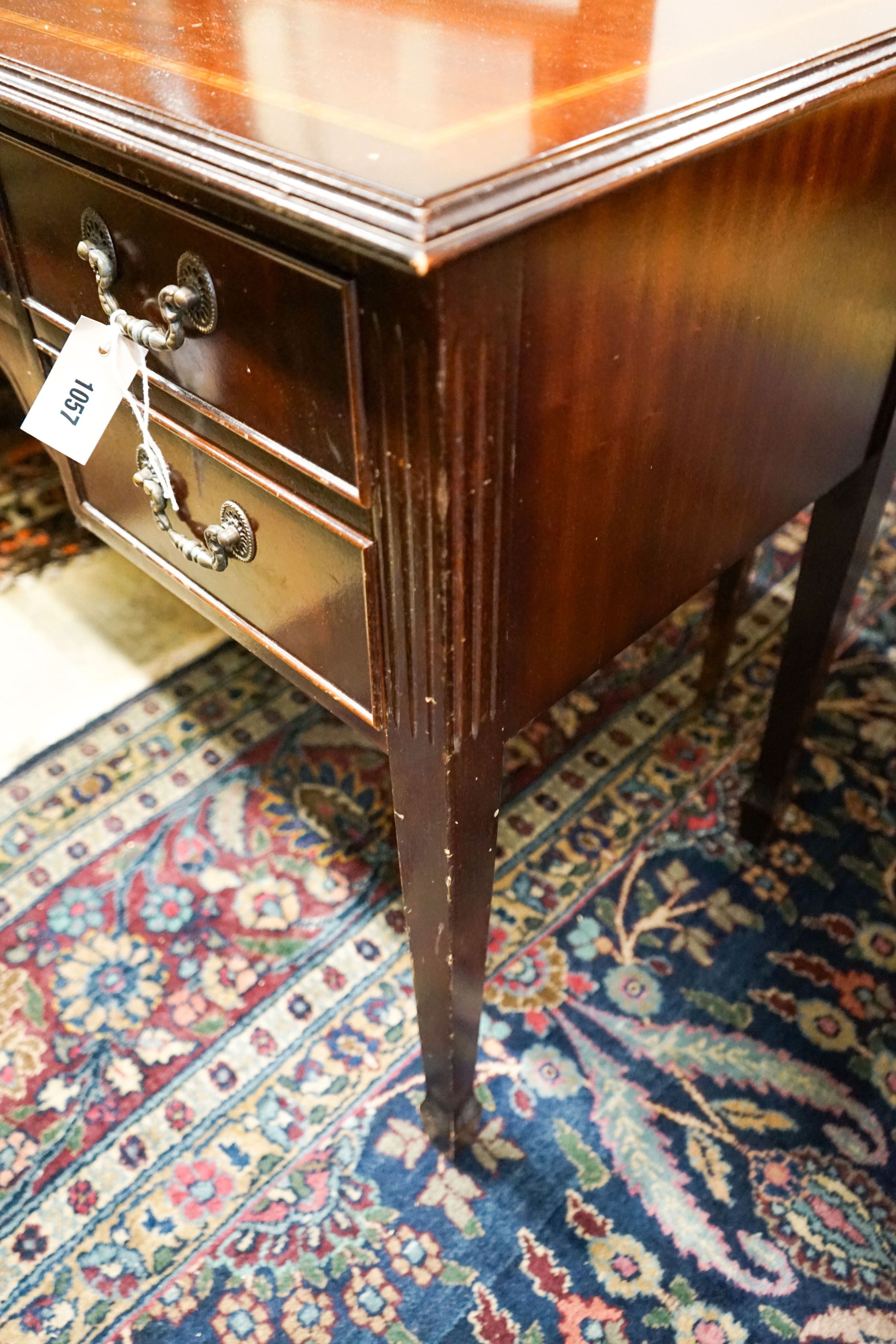 An Edwardian style inlaid mahogany dressing table with swing mirror, length 128cm, depth 54cm, height 158cm